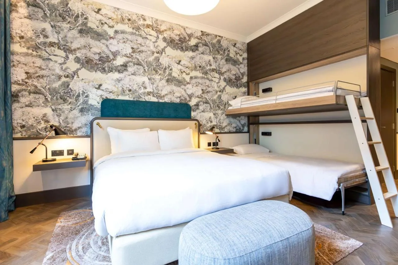 Bedroom with bunk beds and mural at Radisson Blu Hotel, Glasgow