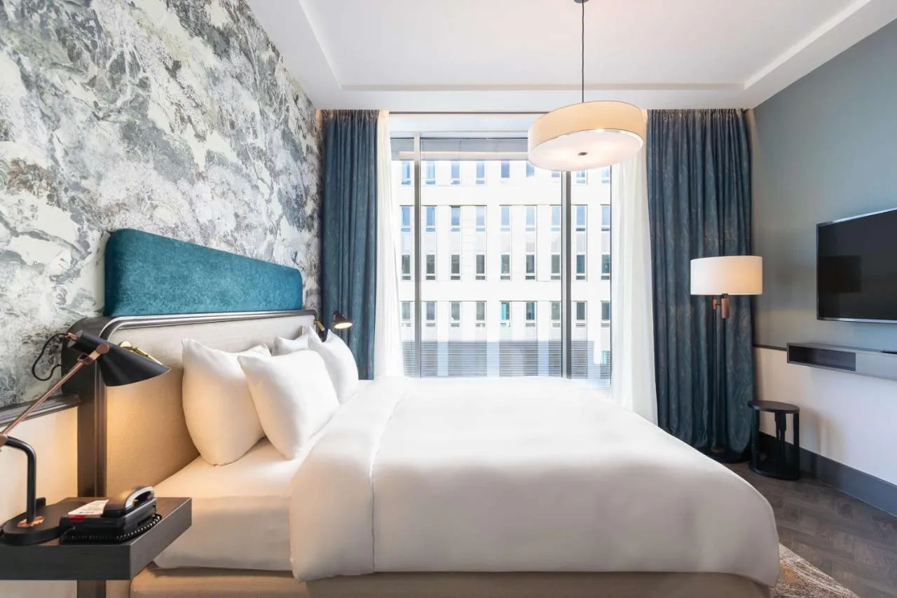 Bright bedroom with large window at Radisson Blu Hotel, Glasgow